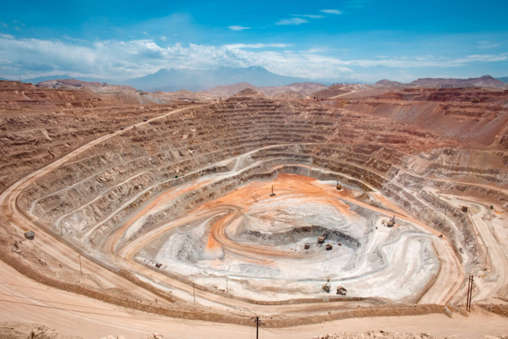 An ariel view of an open pit copper mine